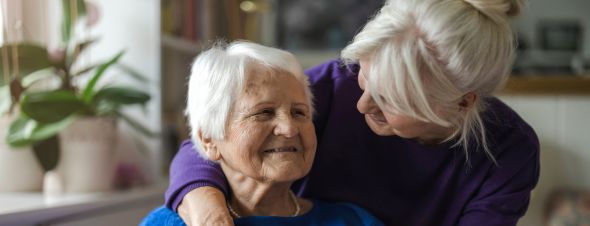 elderly mother with adult daughter