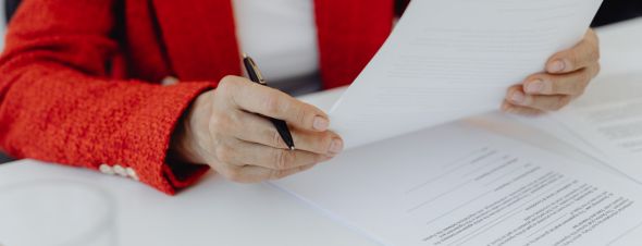 woman looking through documents