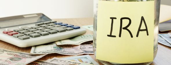 IRA jar, cash, calculator