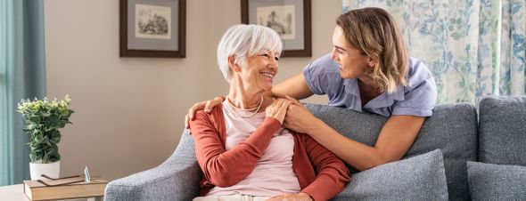 elderly woman with adult daughter